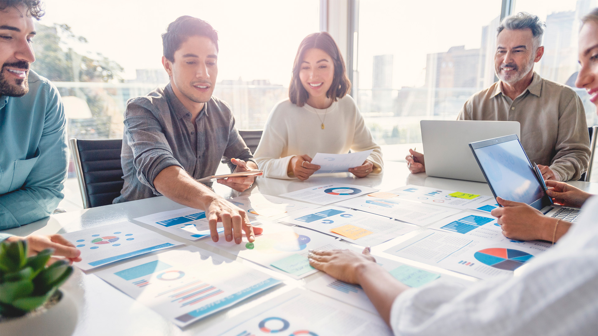Marketing experts working together on company marketing strategy.